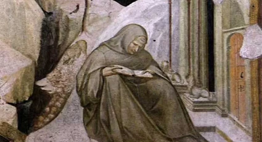 Hermit monk reading the scriptures
